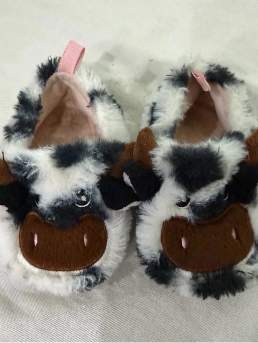 Fuzzy Cow Plush Baby Slippers in White, Black & Brown